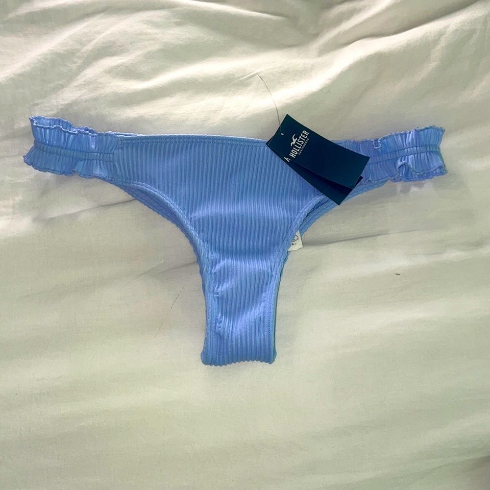 BNWT ribbed + ruffled baby blue cheeky swim bottom